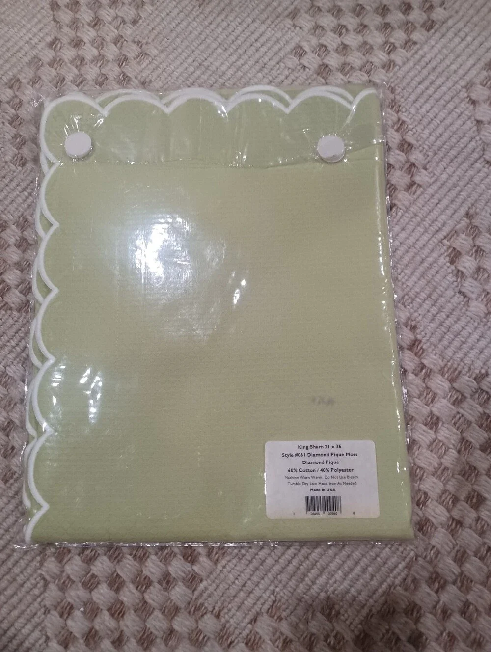 Pair of Matouk Moss Pique King Scalloped Shams.